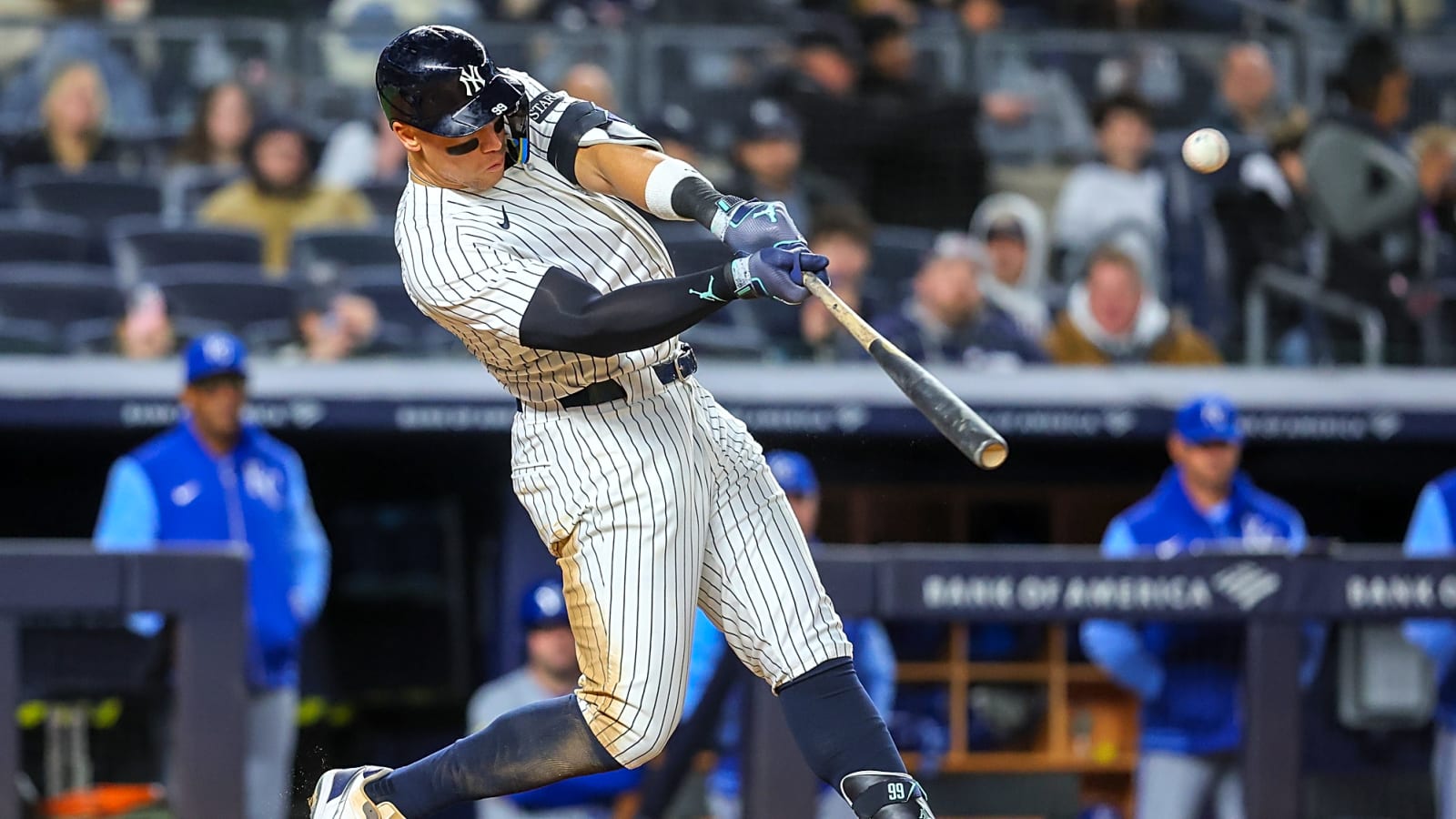 Aaron Judge of the New York Yankees in full swing at home plate as he hits a solo home run in a 2025 game series