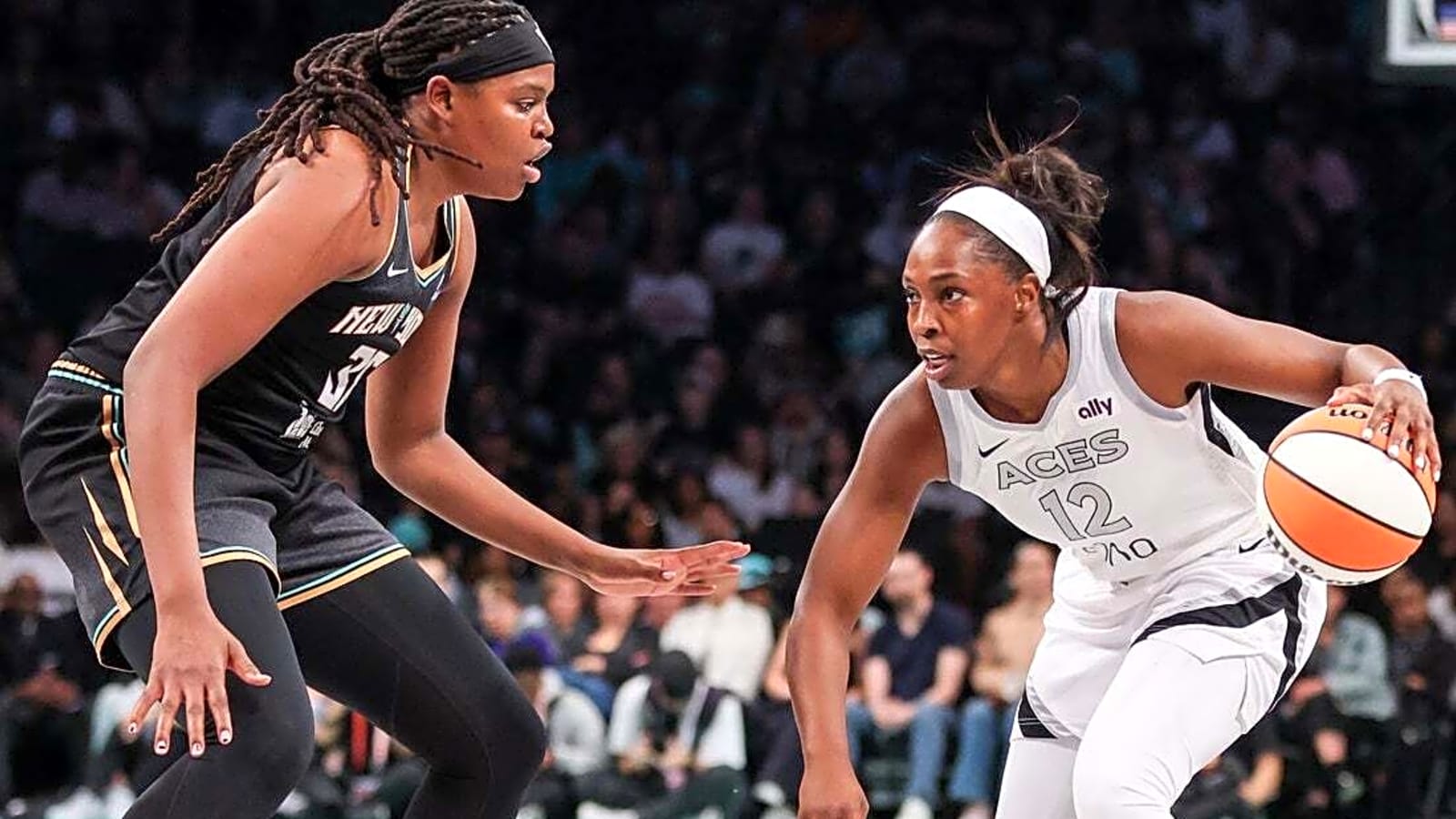 Defending champion Liberty pull away from Aces in opener