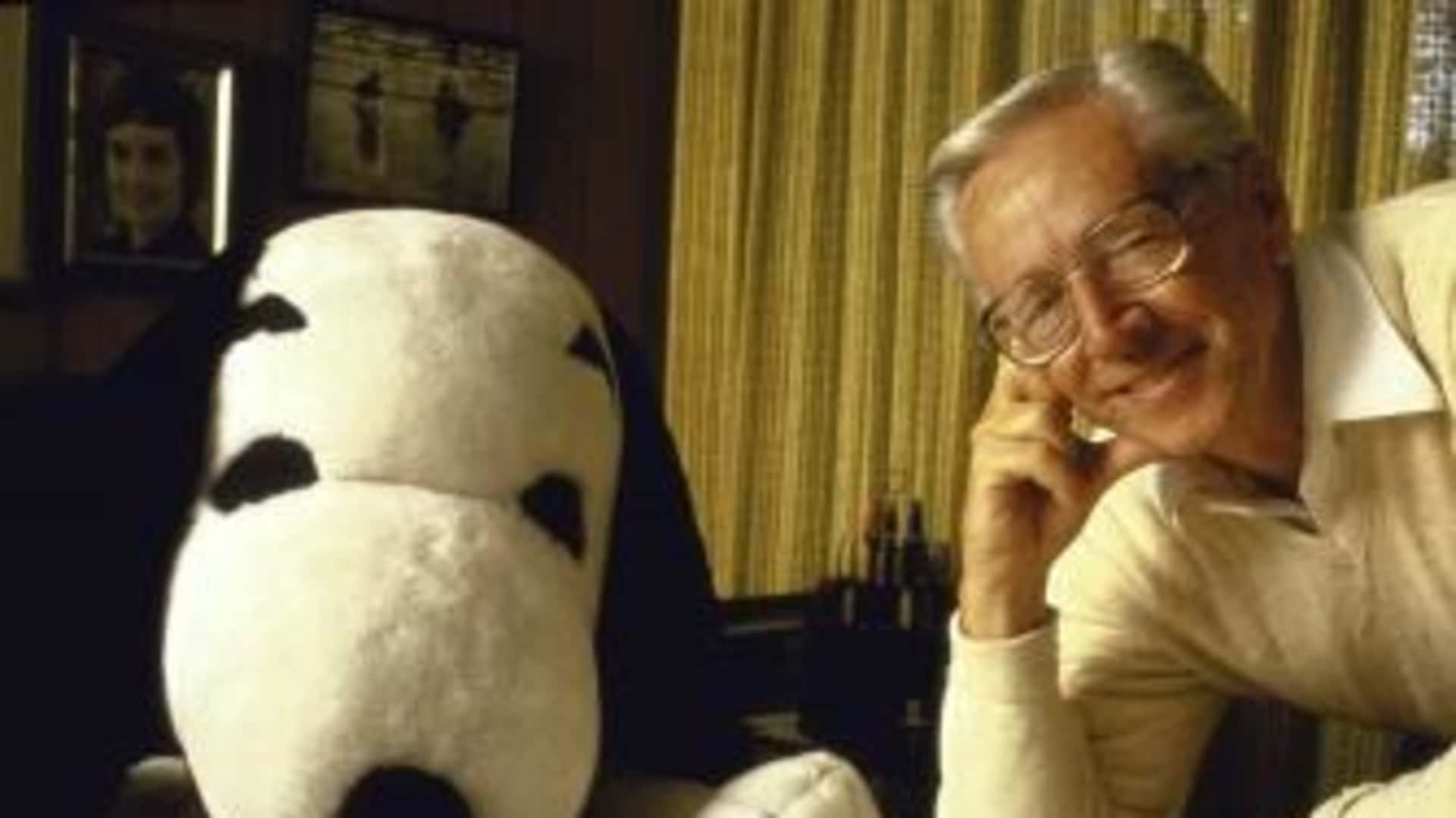 Cartoonist Charles M. Schulz with a life-size Snoopy puppet. (Credit: Matthew Naythons/Getty Images)