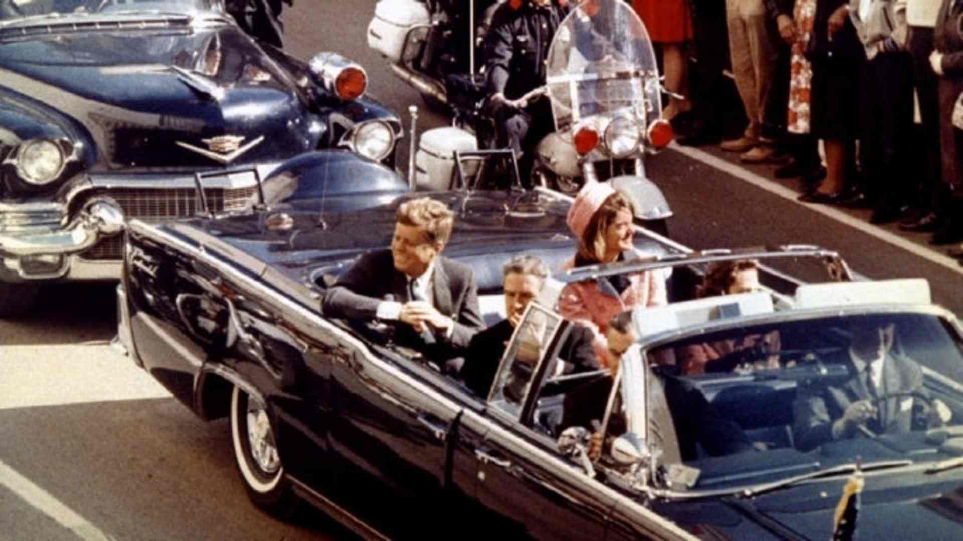John and Jacqueline Kennedy ride through Dallas, Texas, on November 22, 1963.