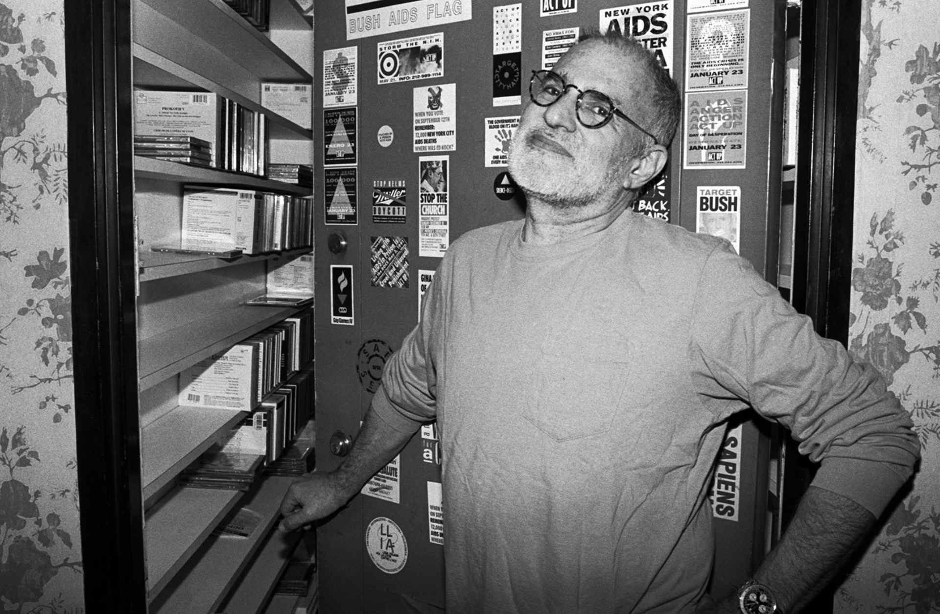 American playwright and gay rights activist Larry Kramer poses for a portrait at the open door of his apartment in April 1993 in New York City.