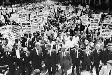 Civil Rights Leaders At The March On WashingtonCivil rights Leaders hold hands as they lead a crowd of hundreds of thousands at the March on Washington for Jobs and Freedom, Washington DC, August 28, 1963. Those in attendance include (front row): James Meredith and Martin Luther King, Jr. (1929 - 1968), left; (L-R) Roy Wilkins (1901 - 1981), light-colored suit, A. Phillip Randolph (1889 - 1979) and Walther Reuther (1907 - 1970). (Photo by Express/Hulton Archive/Getty Images)