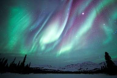 The Aurora Borealis, Orion and Jupiter over Denali National Park in Alaska.