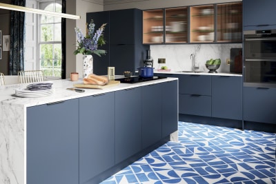 Hoxton kitchen. Smooth slab doors in a painted effect finish. Minimalist styling with your choice of handles and three colours.