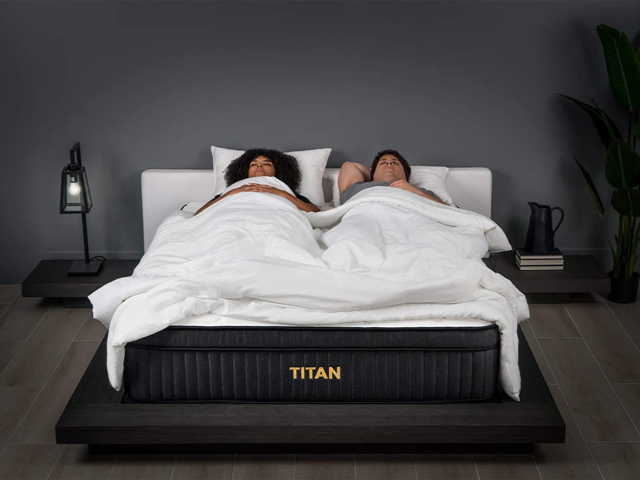 Titan Plus Luxe Mattress with couple laying in bed