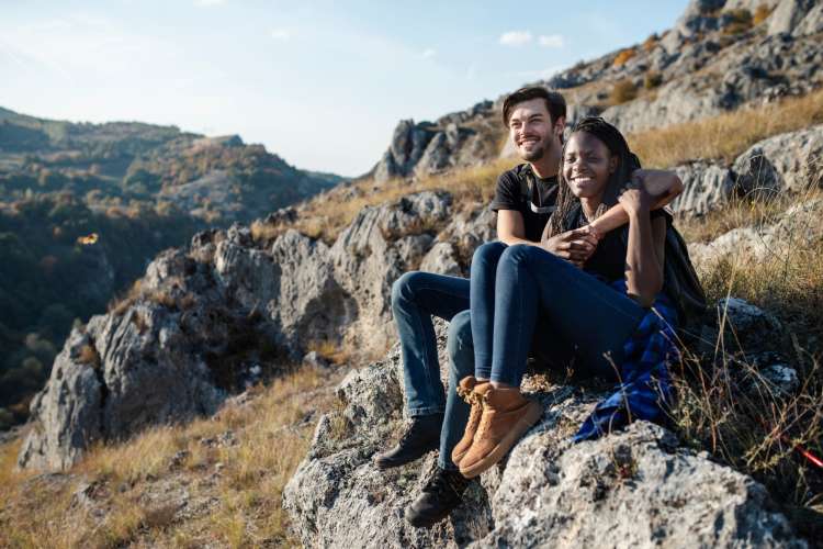 Hiking together is a great outdoorsy fall date idea.