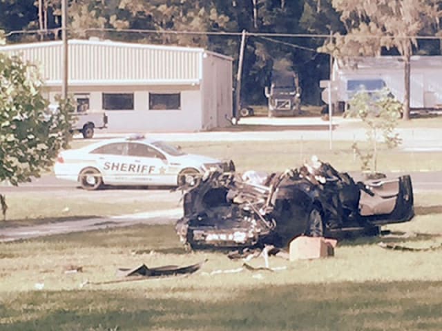 Tesla driver in fatal crash wasn't watching video, witness tells investigators