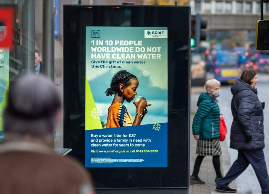SCIAF advertising a clean water campaign in Scotland on a digital screen