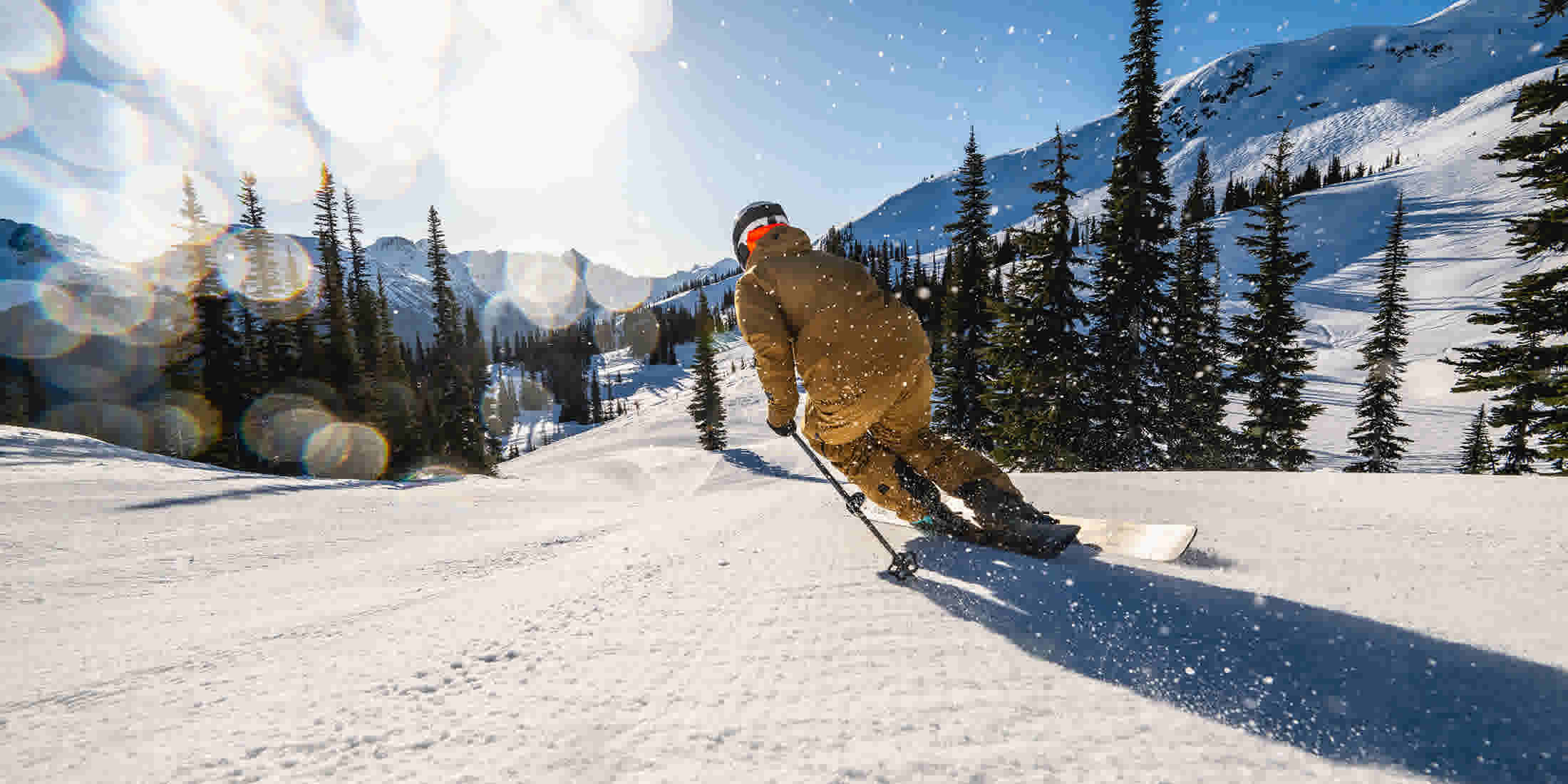 A person skiing in Whistler on a spring day